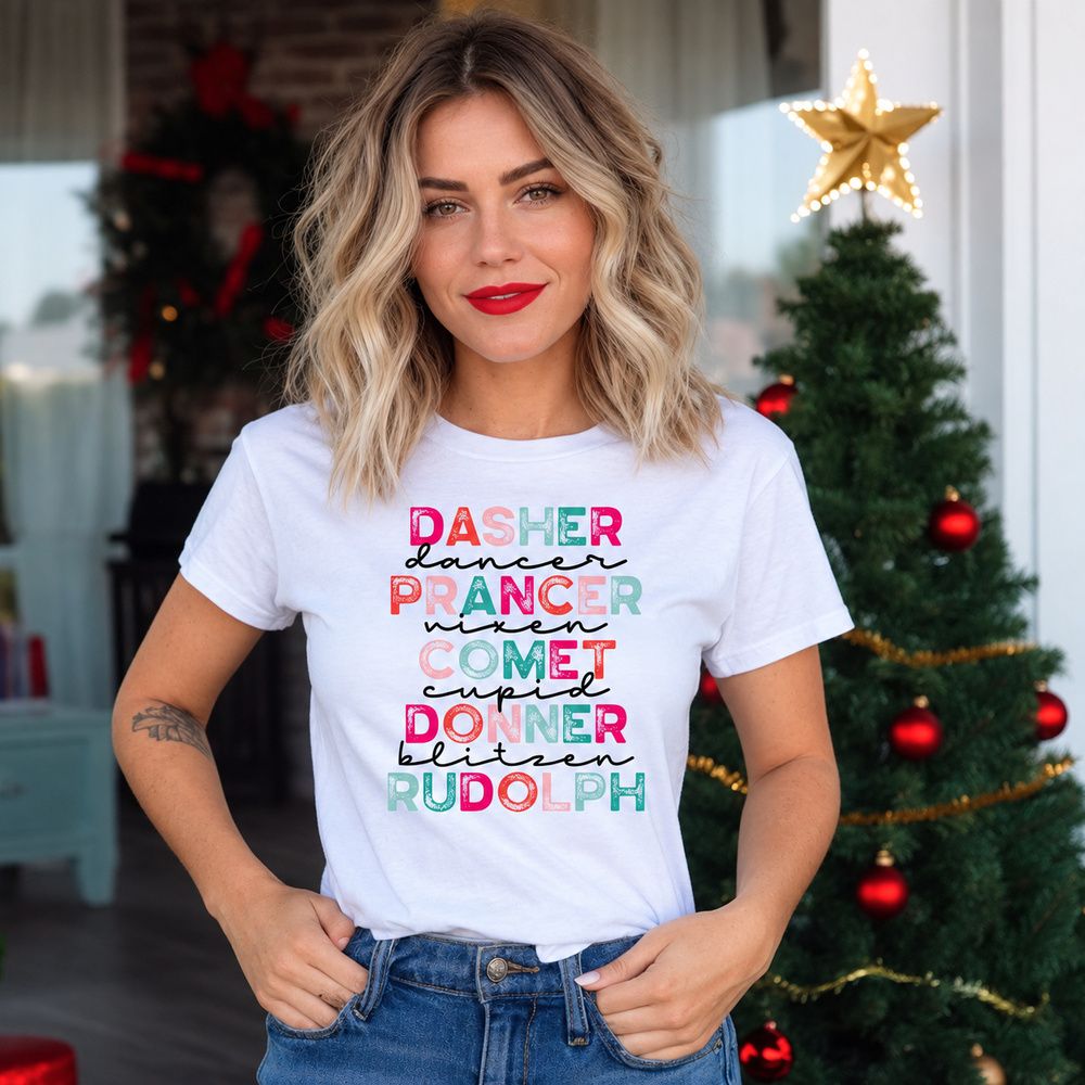 Digital mockup: woman by a Christmas tree in a white tee listing the reindeer names in pink, red and teal lettering